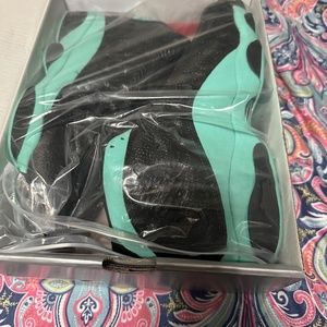 Black an teal nike